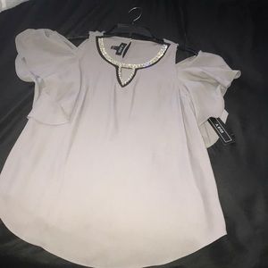 Professional yet sexy business blouse.